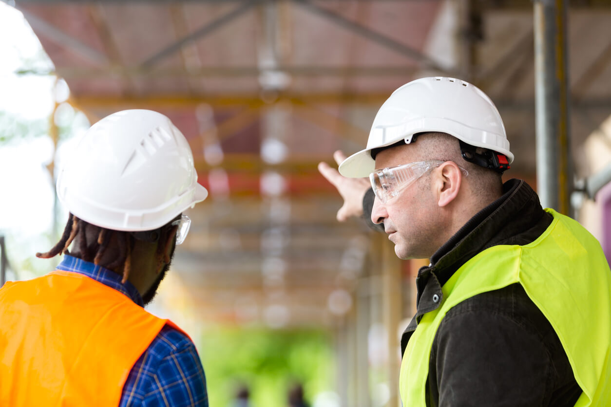 Power Demolition project professionals reviewing an active worksite